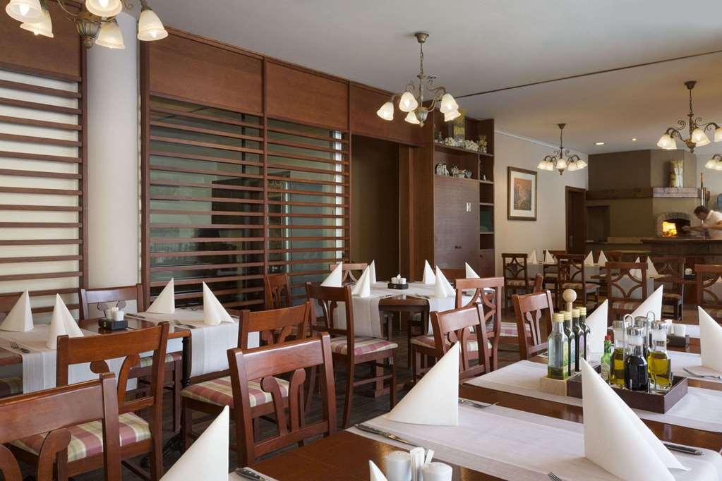 Ramada Hotel & Suites Кранска гора Ресторант снимка