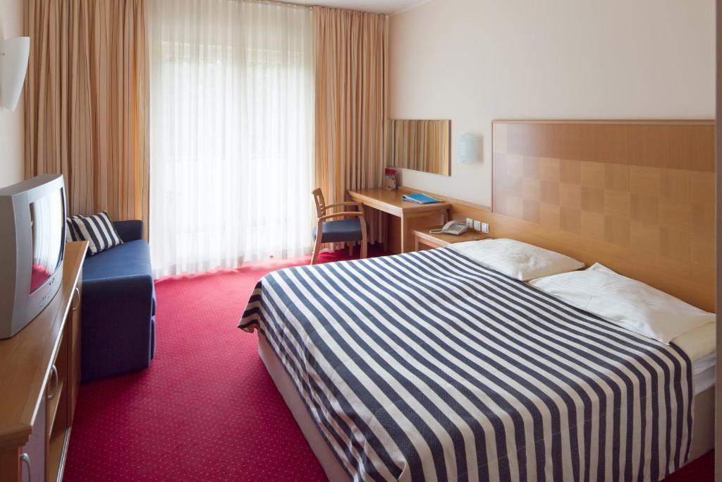 Ramada Hotel & Suites Кранска гора Стая снимка